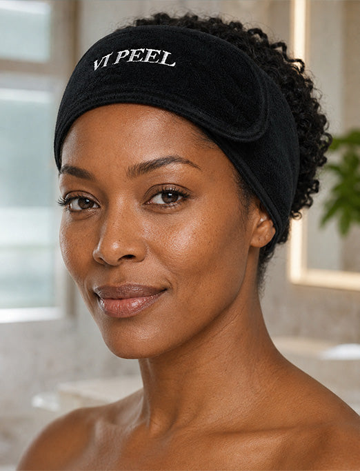 Woman wearing a VI Peel headband